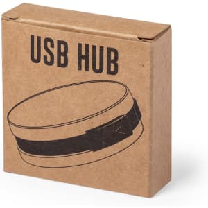 A brown cardboard box containing a USB hub, featuring a circular design and a banded closure.
