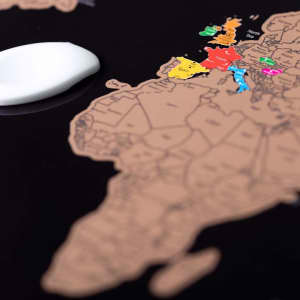 A map featuring a world design in earthy tones, highlighting regions in bright colours. Includes a logo.