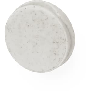 A circular white phone stand made of marble-like material with a smooth surface and a subtle speckled pattern.