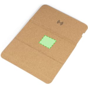 A wireless charger mousepad in a natural cork finish, featuring a branding logo and a central charging area.