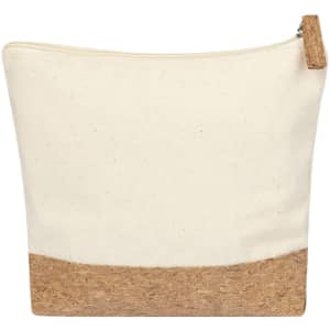 A toiletry bag featuring a cream fabric body and a cork base, with a zipper closure and a small tag.
