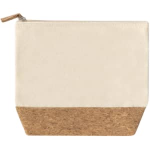 A toiletry bag featuring a cream fabric top and a cork bottom, with a zip closure and a simple design.