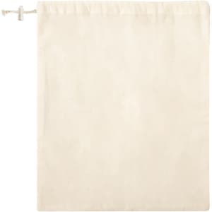 A beige drawstring bag with a smooth texture and a closed top, featuring a logo.