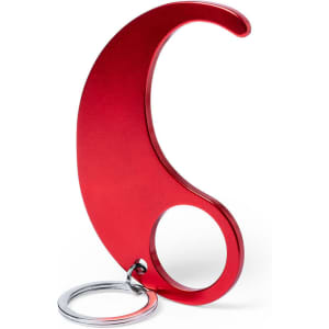 A red keyring tool in a curved design, featuring a metal keyring attachment.