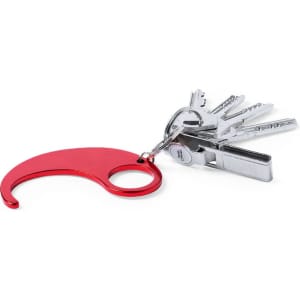 A red Kozko Keyring Anticontact attached to a set of keys, featuring a simple, curved design and a metal finish.
