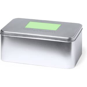A silver tin box with a smooth finish and a green label on top. It has a sleek, modern design.
