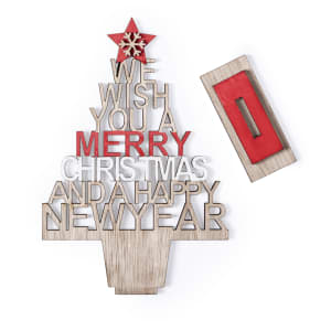 A wooden Christmas tree decoration with a red star, featuring festive messages in red, white, and grey lettering.