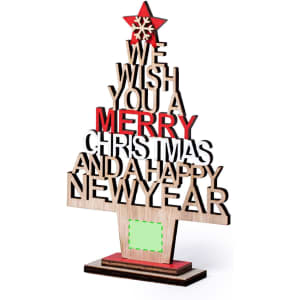 A wooden Christmas tree decoration featuring red and unpainted letters. It includes a star on top and branding.
