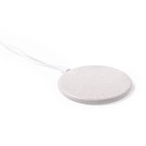 A round, light grey wireless charger with a white cable attached, featuring a minimalistic design.