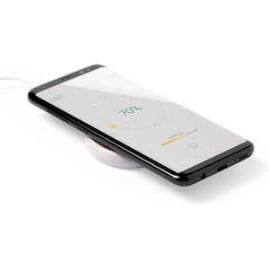 A wireless charger with a sleek design in grey, featuring a smartphone displaying a charging status.