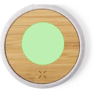 A round wireless charger featuring a bamboo surface with a green centre and a light-coloured outer rim.