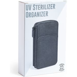 A dark grey UV sterilizer organizer in a white box, featuring a front pocket and a branding logo.