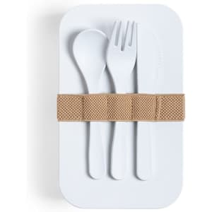 A white lunch box featuring a tan elastic strap and cutlery, including a spoon, fork, and knife.