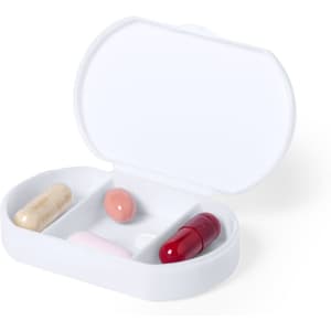 A white antibacterial pillbox opened to reveal four capsules in various colours. The box has a simple design and branding.