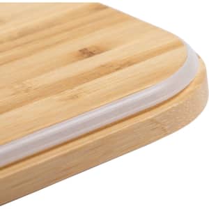 A bamboo lunch box with a clear silicone seal around the edge, showcasing a smooth, rounded corner.