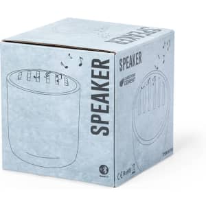 A light blue box featuring a speaker design and a logo, with illustrations of speaker details on the top.