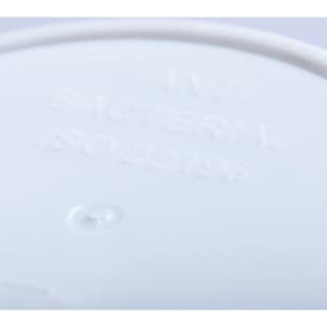 A white antibacterial cup with a smooth surface and a logo on the bottom.