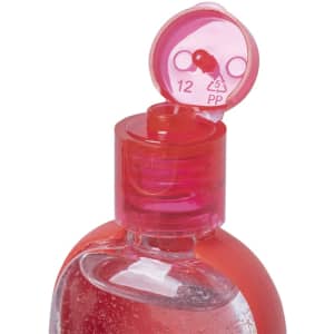 A clear hand sanitiser bottle with a pink cap, featuring a small dispenser opening.