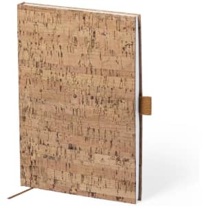 A cork-covered notepad with a textured surface, featuring a brown elastic closure and a simple design.