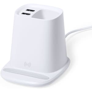 A white multifunction pencil holder with two USB ports and a wireless charging pad at the base.