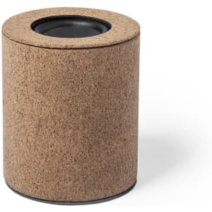 A cylindrical speaker covered in a natural cork material with a black base.
