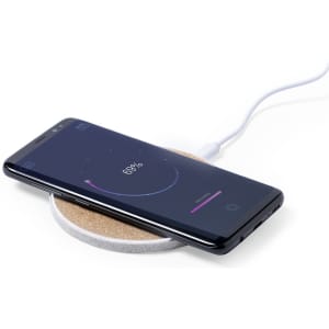 A wireless charger in grey and white, with a smartphone displaying a battery charging status of 60%.