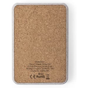 A rectangular power bank with a cork texture and silver edges, featuring USB ports and a branding logo.
