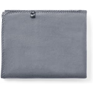 A grey blanket featuring stitched edges and a small logo. Suitable for home décor or comfort use.