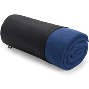 A rolled blanket featuring a blue fleece interior and a black outer cover, with a branding label visible.