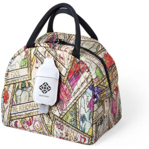 A patterned pouch featuring a hand sanitiser on the front and sturdy black handles. It has a colourful design.