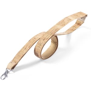 A lanyard made of cork material featuring a silver clip, with natural beige tones and a textured surface.