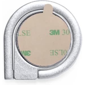 A silver phone holder with a circular adhesive backing, designed for attaching to surfaces.