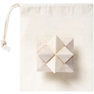 A wooden puzzle featuring geometric shapes, presented in a cream-coloured drawstring bag.