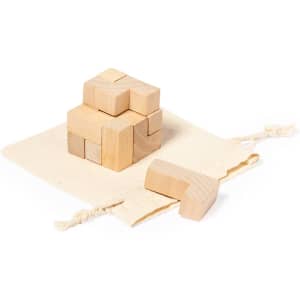 A set of wooden puzzle blocks in natural colour, resting on a cotton bag. The blocks are arranged in a stacked formation.
