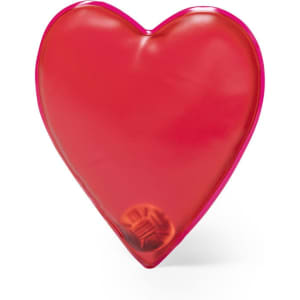 A heart-shaped heat pack in bright red, featuring a small circular component inside, with a branding logo.