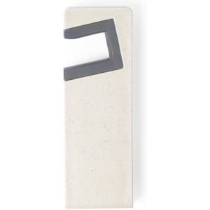 A phone stand in a rectangular shape, featuring a grey accent on a light-coloured base. It has a simple design and logo.