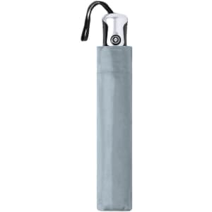 A silver umbrella enclosed in a light grey sleeve, featuring a sleek handle and a carrying strap.