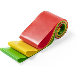 A set of exercise bands in red, yellow, and green rolled together, ideal for various fitness activities.