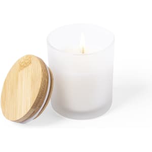 A white aromatic candle in a frosted glass jar, accompanied by a bamboo lid.