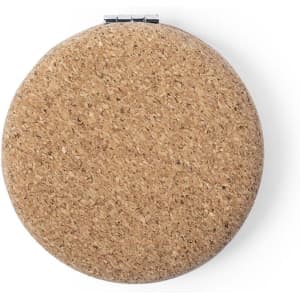A round cork pocket mirror with a sleek metal clasp, featuring a natural beige colour.