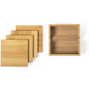 A set of bamboo coasters in a square storage box. The coasters feature a natural wood finish.