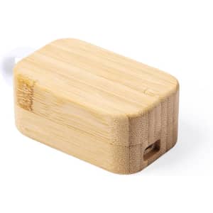 A bamboo charging case for earphones, featuring a smooth, natural wooden texture and a small USB port.