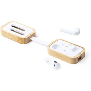 A pair of white earphones rests beside a bamboo charging case, showcasing a sleek design with a logo on the case.