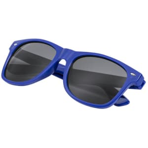 A pair of blue sunglasses with dark lenses and a logo on the side.