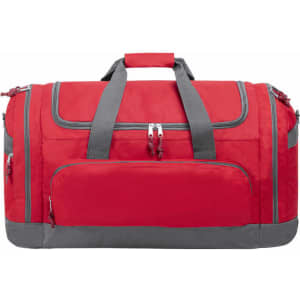 A bright red duffle bag with grey accents and multiple zippered compartments. It features sturdy handles.