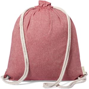 A pink drawstring bag with cream-coloured cords and a branding label at the bottom.