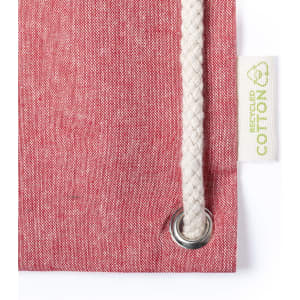 A red drawstring bag with a white rope cord and a tag indicating recycled cotton material.