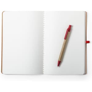 An open notebook with blank pages and a red pen resting on the right side. The notebook features a brown cover.