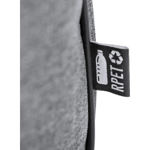 A grey bag with a textured surface and a label indicating it is made from recycled materials.