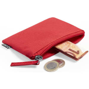 A red zippered purse with Australian coins and banknotes partially visible. It features a logo.